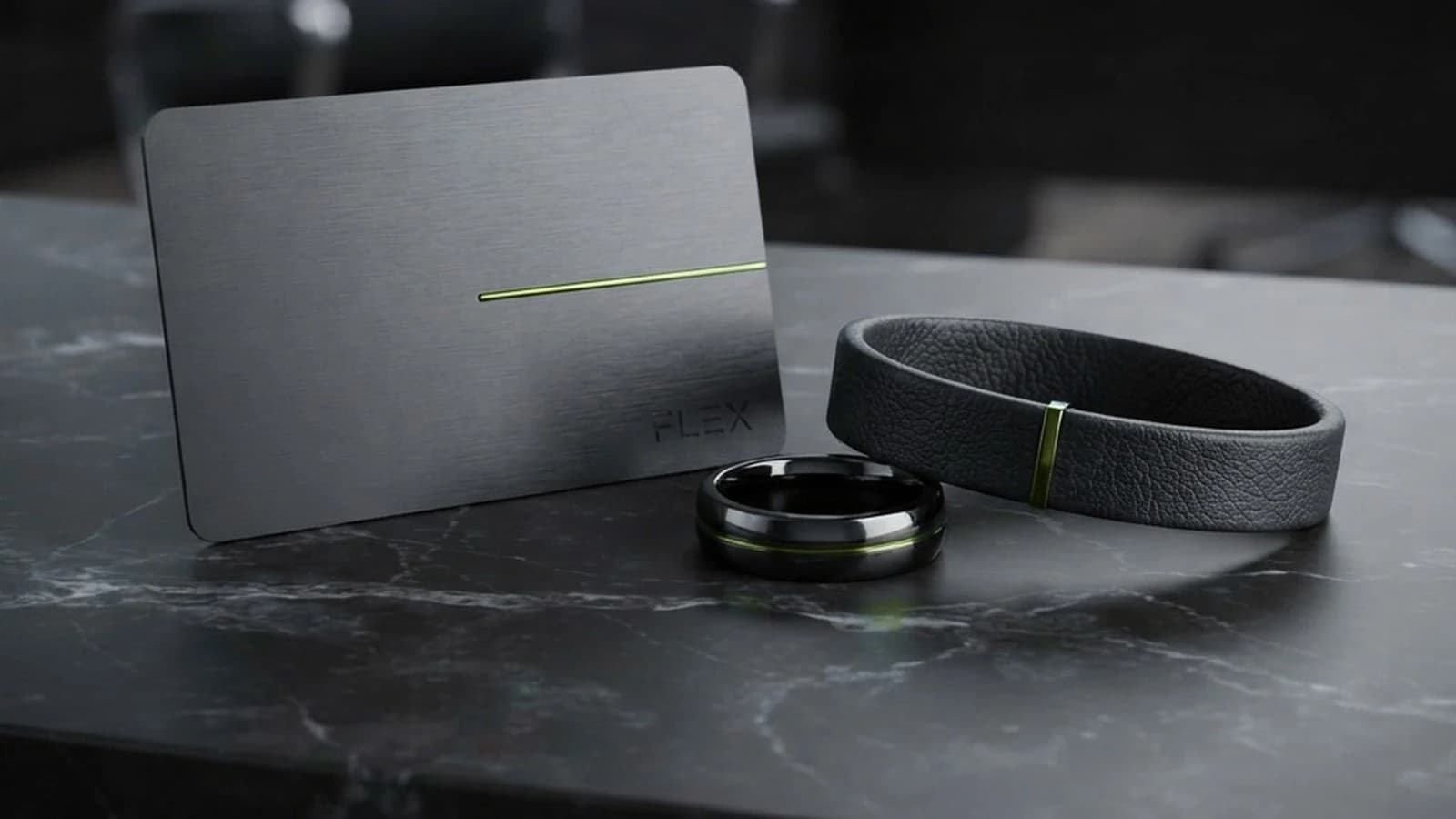 A card, a ring and a band on one table